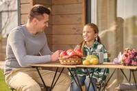 elements_envato_com___dad-and-daughter-talking-at-table-on-veranda-2022-01-17-21-35-24-utc.jpg