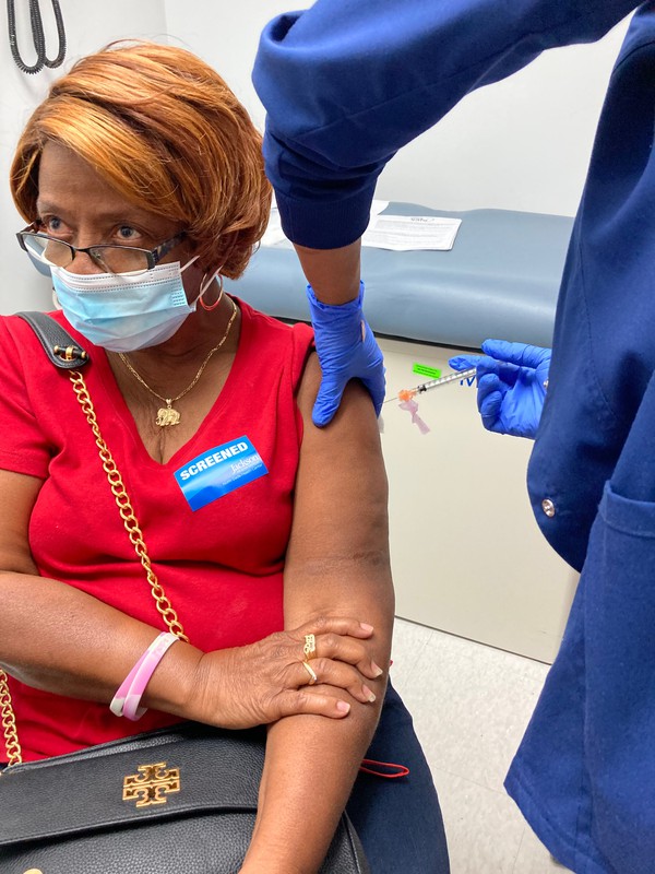 Pat getting her vaccine.jpg